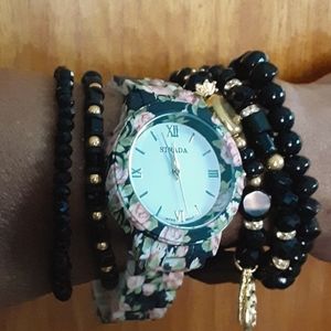 Strata floral watch with charm bracelet